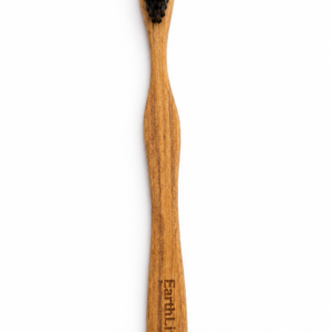 Earthlife Co. Neem wood charcoal toothbrush with rich darker wood grain